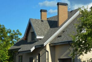 A house with a pitched roof with installed asphalt shingles, skylights, dormer windows, ceiling