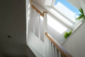 Abstract skylight view looking up stairs