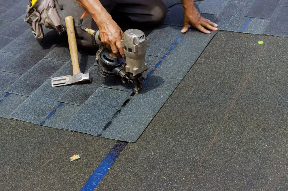 Installing new bitumen shingles on roof
