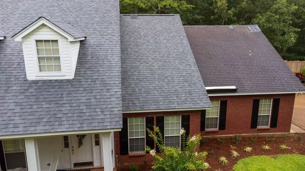 New roof and old roof on house
