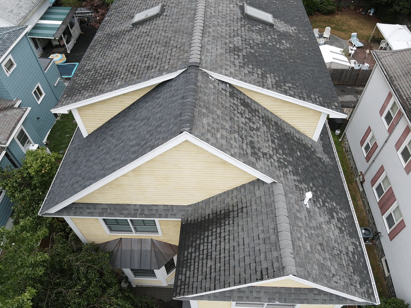  Professional inspecting roof for signs of leaks
