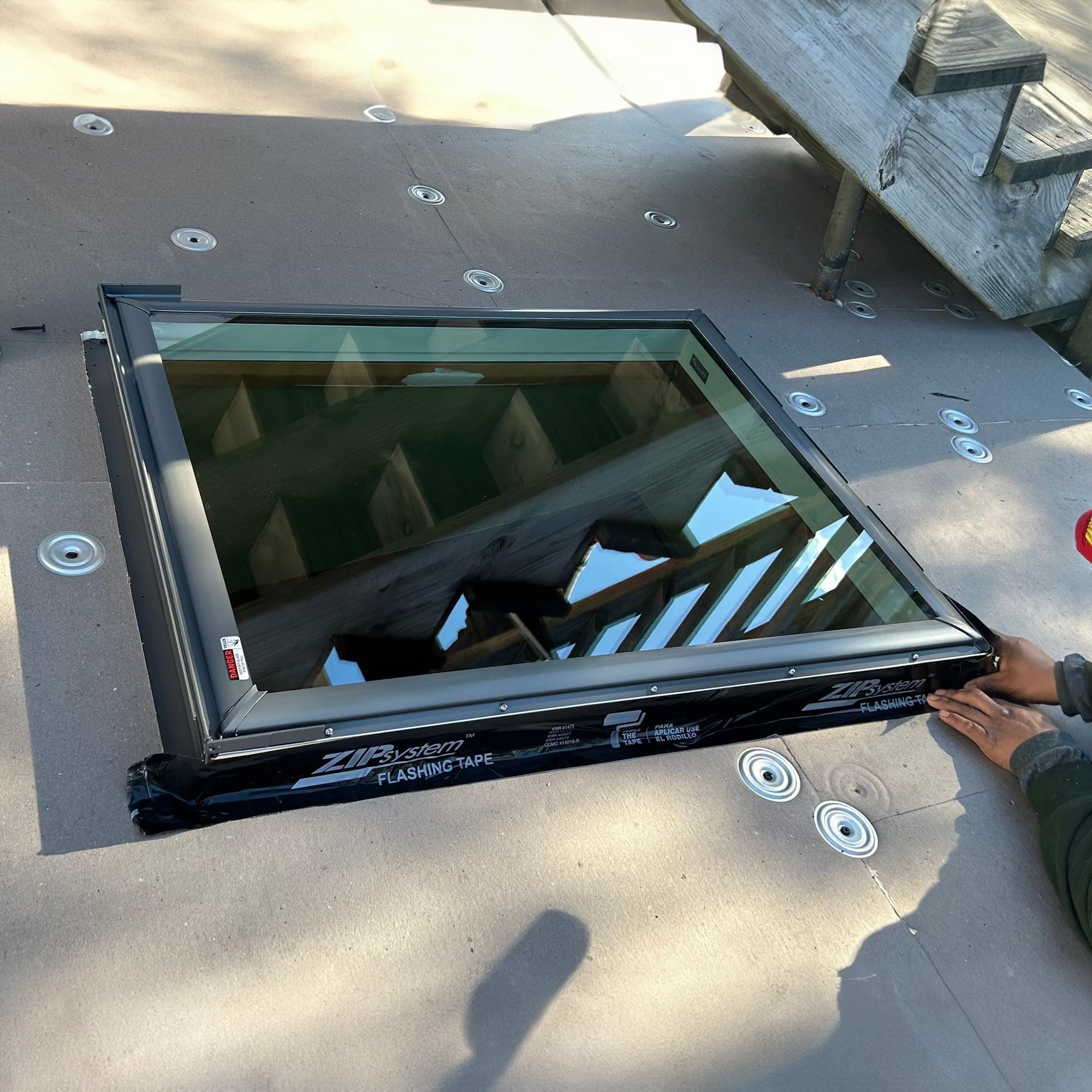 Installing a transparent skylight with precision and care