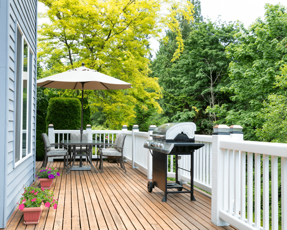 Clean outdoor wooden deck and patio of home
