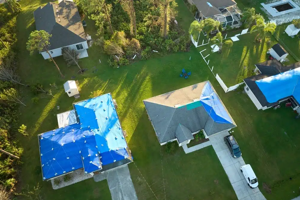 Top view of leaking house roofs covered
