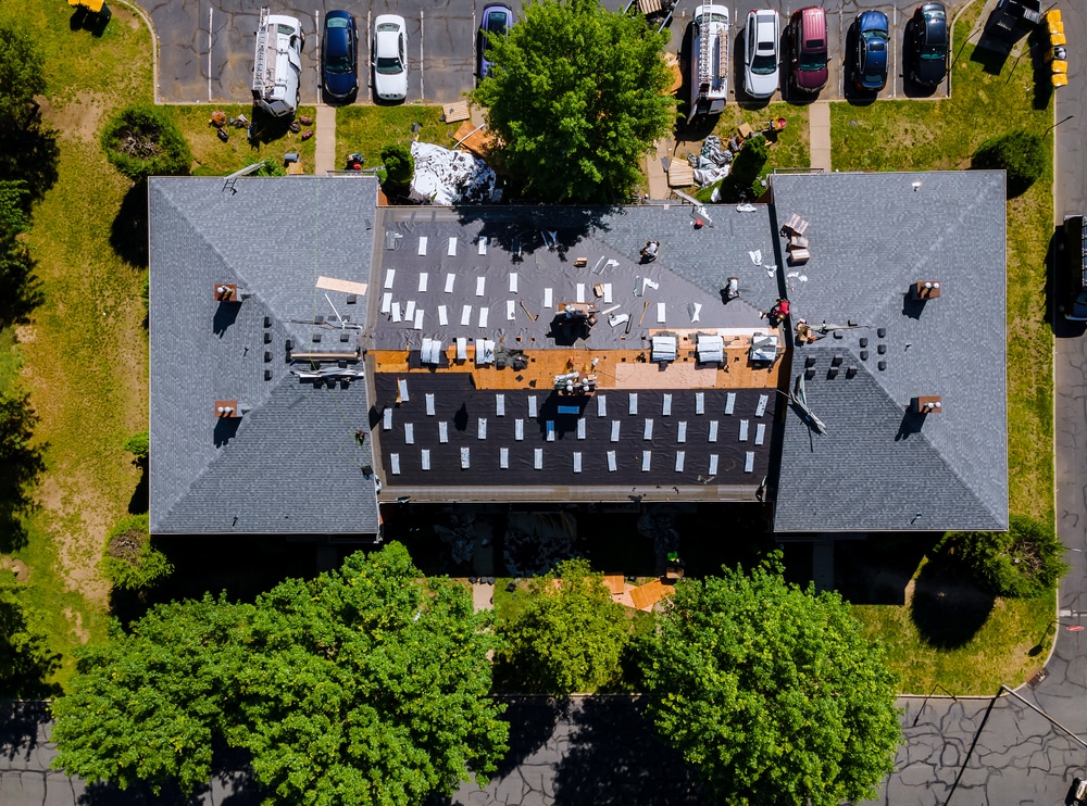 Removal of old roof and replacement roofs with new roof shingle
