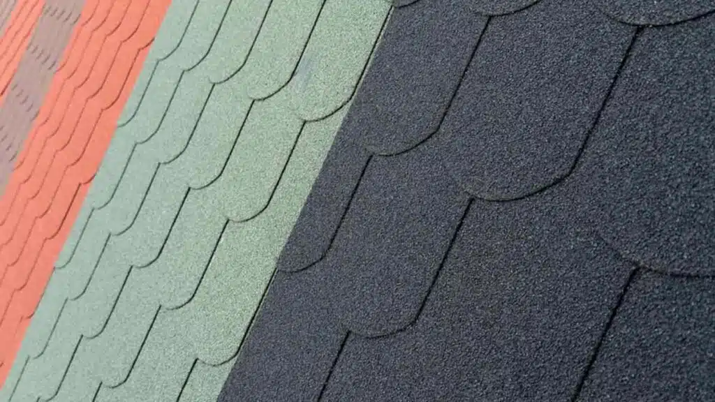 The sloped roof features a variety of colored shingles, including green, red, and black tiles