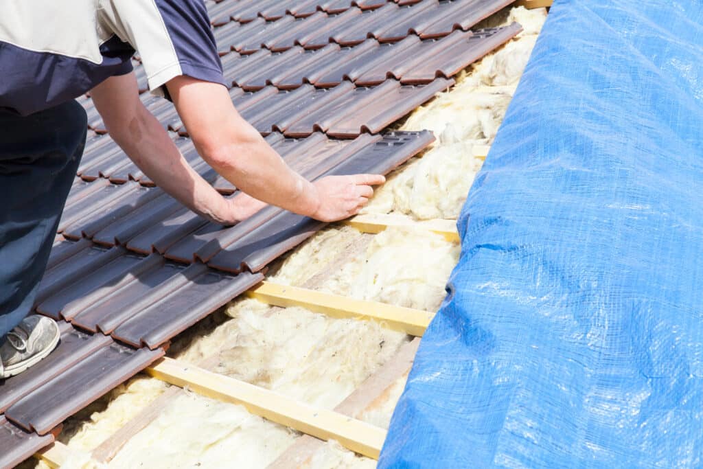  Roof underlayment layer between roof deck and shingles