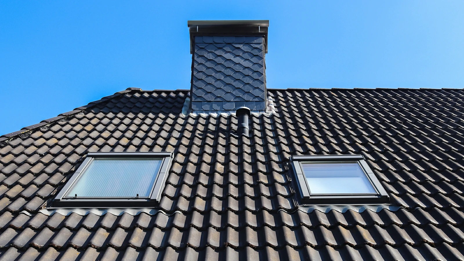 a-closeup-shot-of-a-roof-in-velux-style-with-black-2026-01-11-09-25-37-utc-1