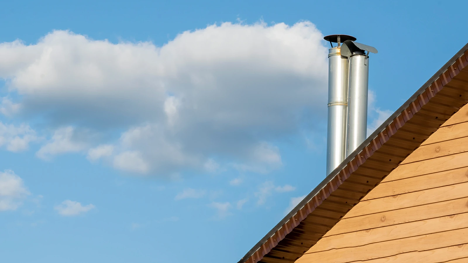 roof-of-the-building-and-chimney-day-of-summer-2026-01-06-10-52-57-utc-1