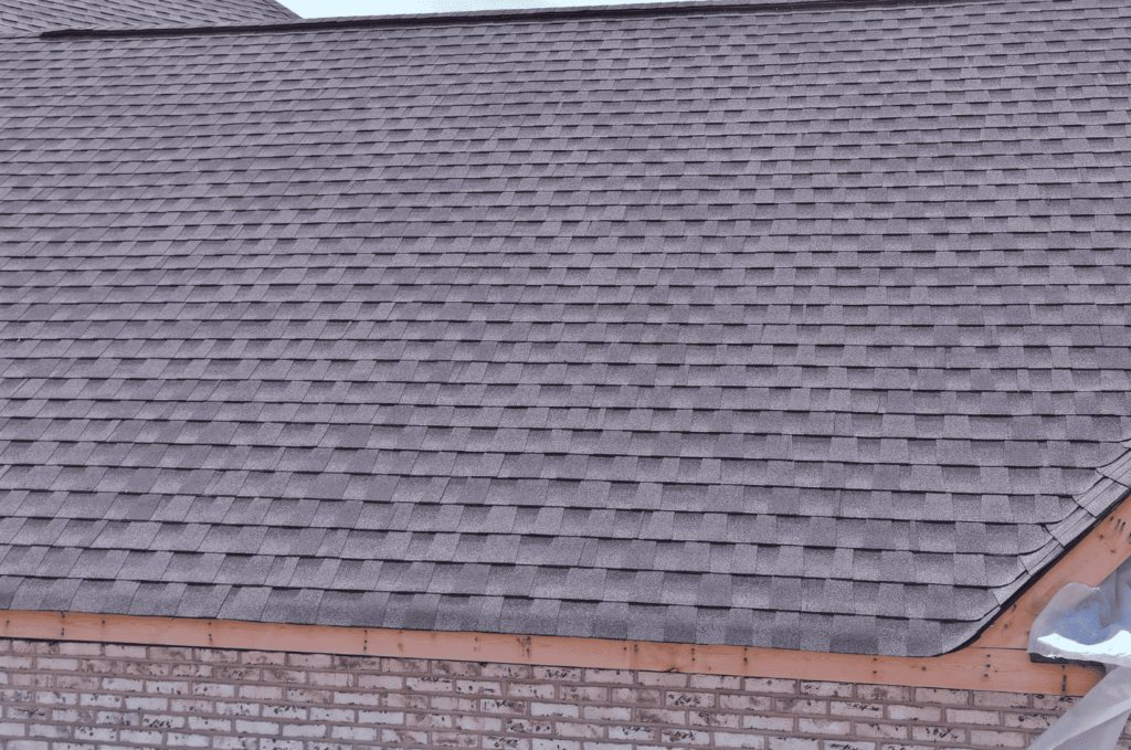 Newly installed asphalt shingle roof designed to protect the home from future roof damage