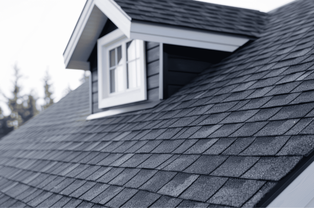 Close view of new shingles installed during a roof replacement, showing a clean and durable surface for long-term use