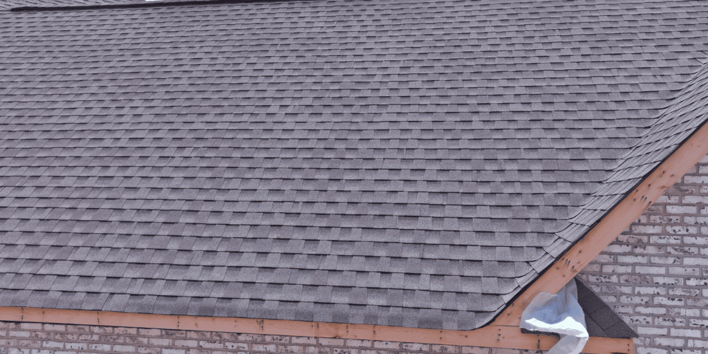 Completed roof replacement with evenly installed shingles, providing strong protection and a neat, finished look