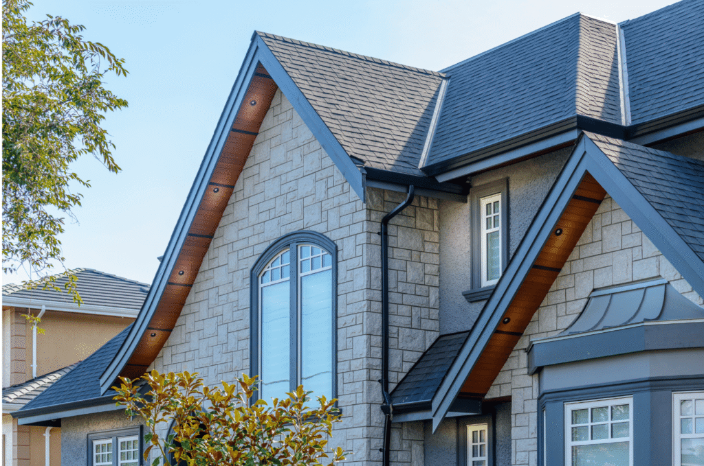 Home with worn shingles and aging roof, visible roof replacement signs that indicate it may need a new roof soon