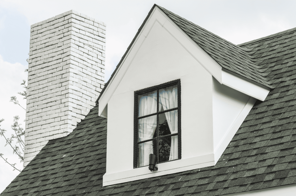 Home exterior showing a well-maintained shingle roof after roof repair, improving safety and overall appearance