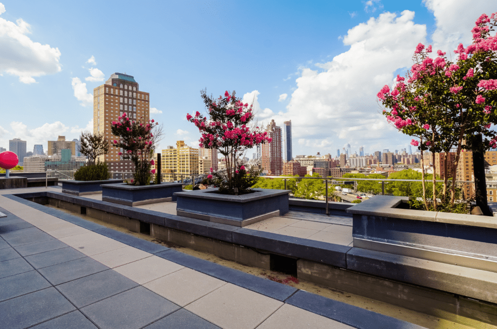 Commercial flat roof during a spring roof inspection, showing clean surfaces and sealed areas ready for warmer seasons