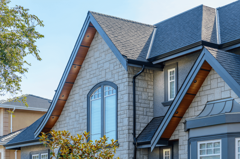 Modern home with a clean asphalt shingle roof designed to protect the house from rain, wind, and changing weather
