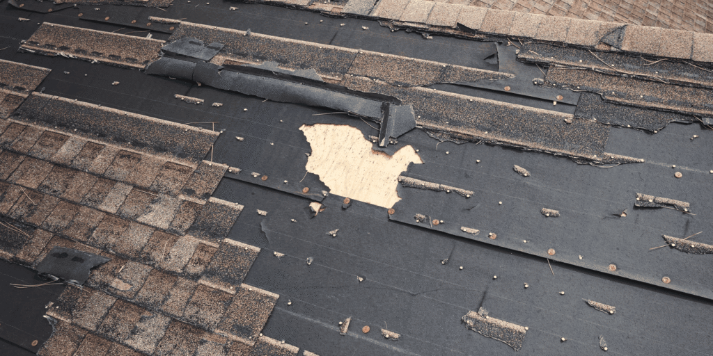 Close-up of a small roof hole being patched to stop leaks, prevent moisture damage, mold, and costly home repairs