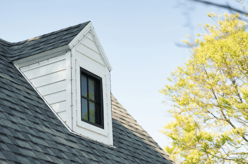 Dormer roof on a Boston home, showing roof shape details that can affect roof vents and attic airflow during roof inspection