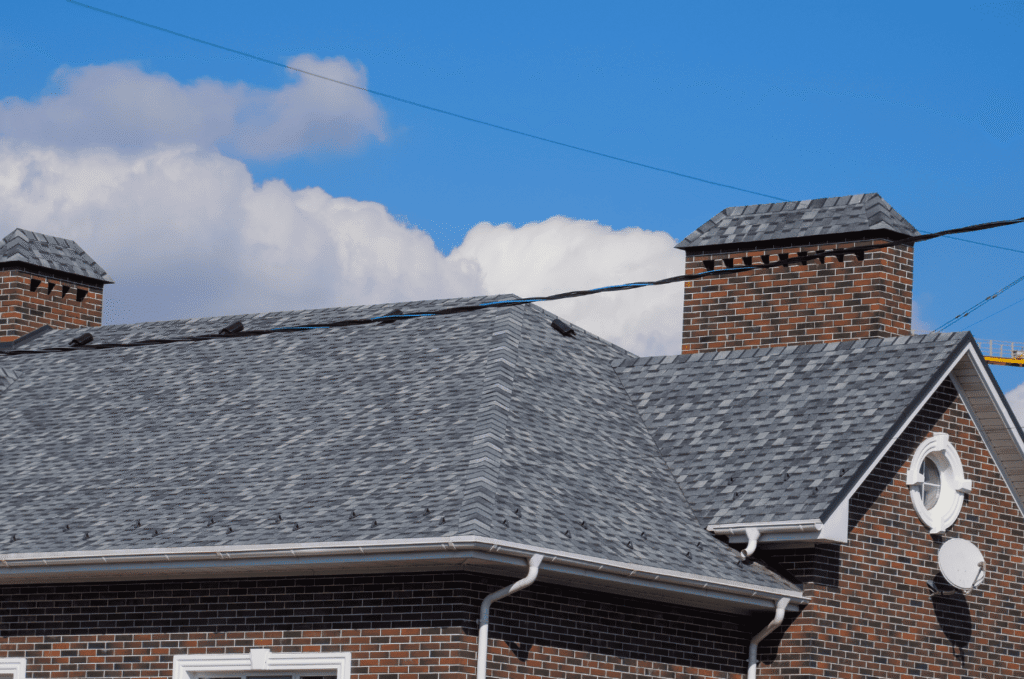 Neatly installed soffit, fascia, and gutter on a modern home, the kind of upkeep that prevents soffit and fascia damage