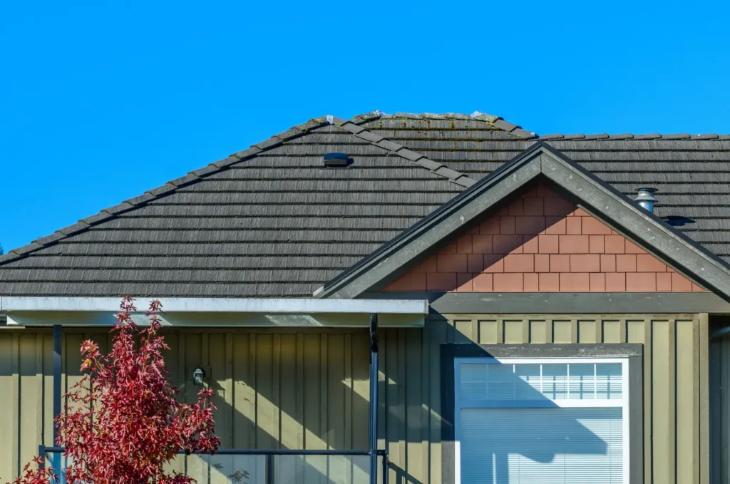 Roofing materials made of asphalt shingles covering the roof of a residential home