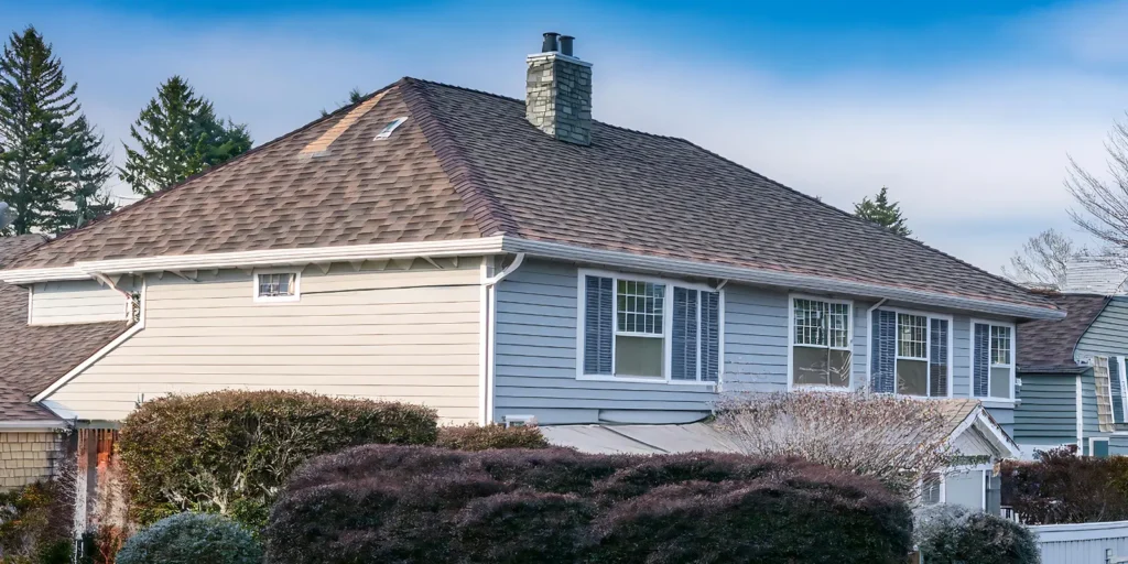 Roofing materials like asphalt shingles covering a residential roof with a clean, even finish