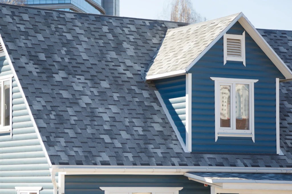 Material selection for a mixed roof using different roofing surfaces for durability and appearance