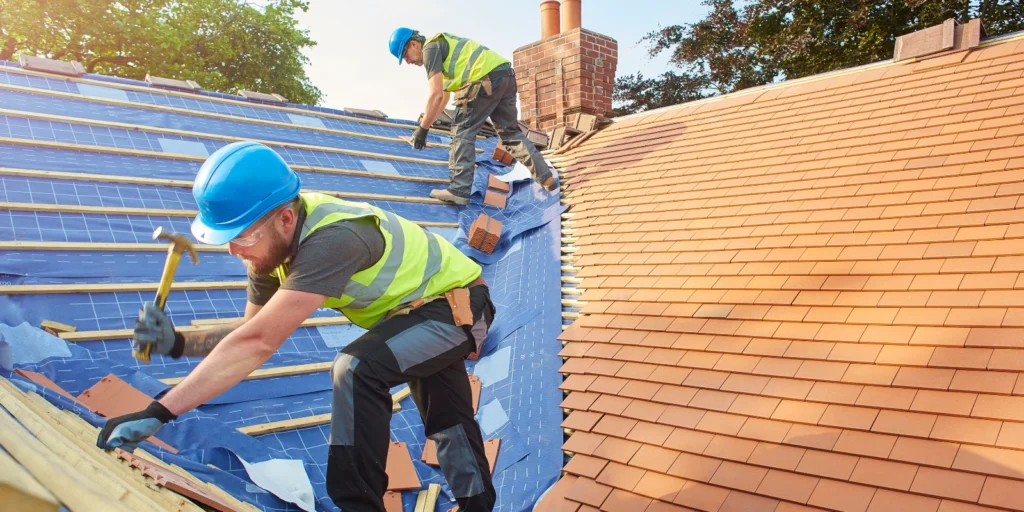 Mixed roof materials combine asphalt shingles for a practical, balanced design