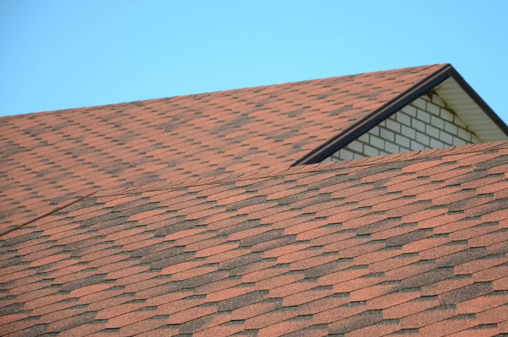 Asphalt shingle roof after roof rejuvenation treatment for improved appearance and longer life