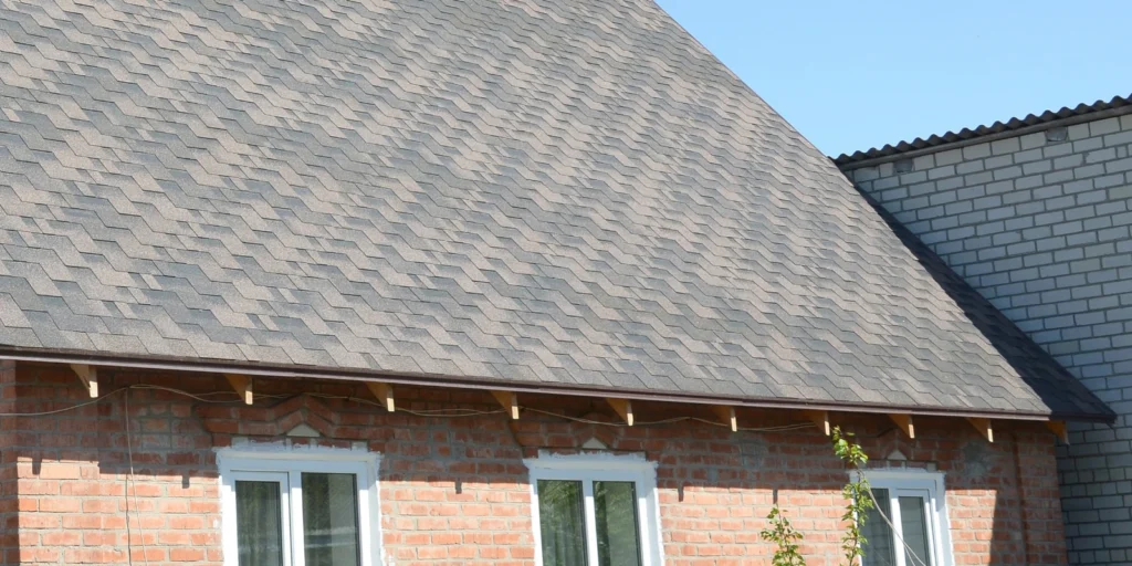 Roof rejuvenation treatment applied to asphalt shingles to help extend roof life and improve protection