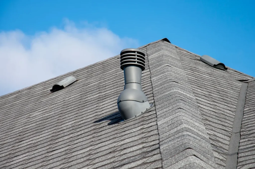 Asphalt shingle roof in good condition after professional roof patching and repair