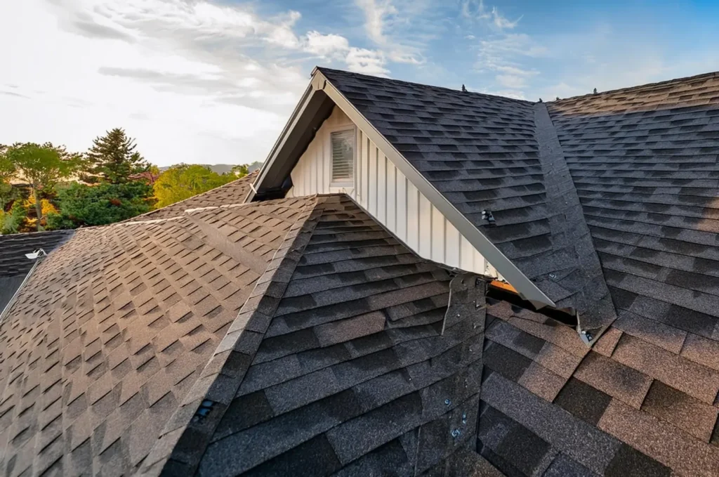 Asphalt shingle roof on a residential home with no visible storm damage or missing shingles